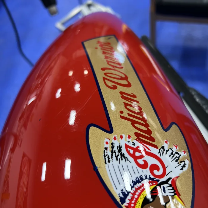 Motorcycle tank after paintless dent repair