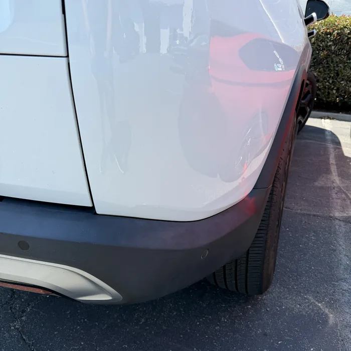 SUV quarter panel after paintless dent repair
